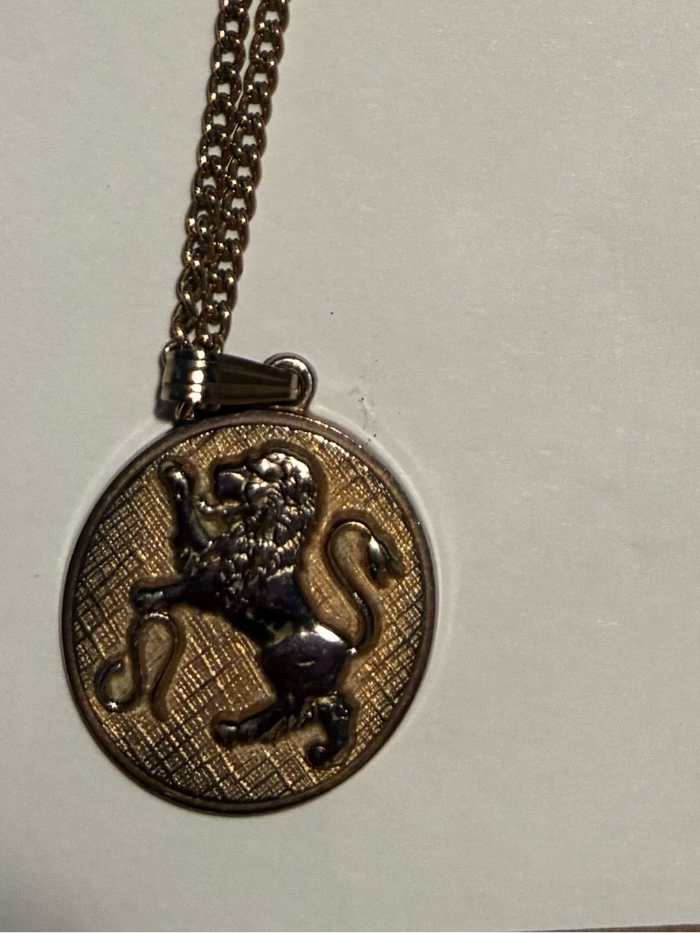Vintage Anison zodiac lion pendant on chain .